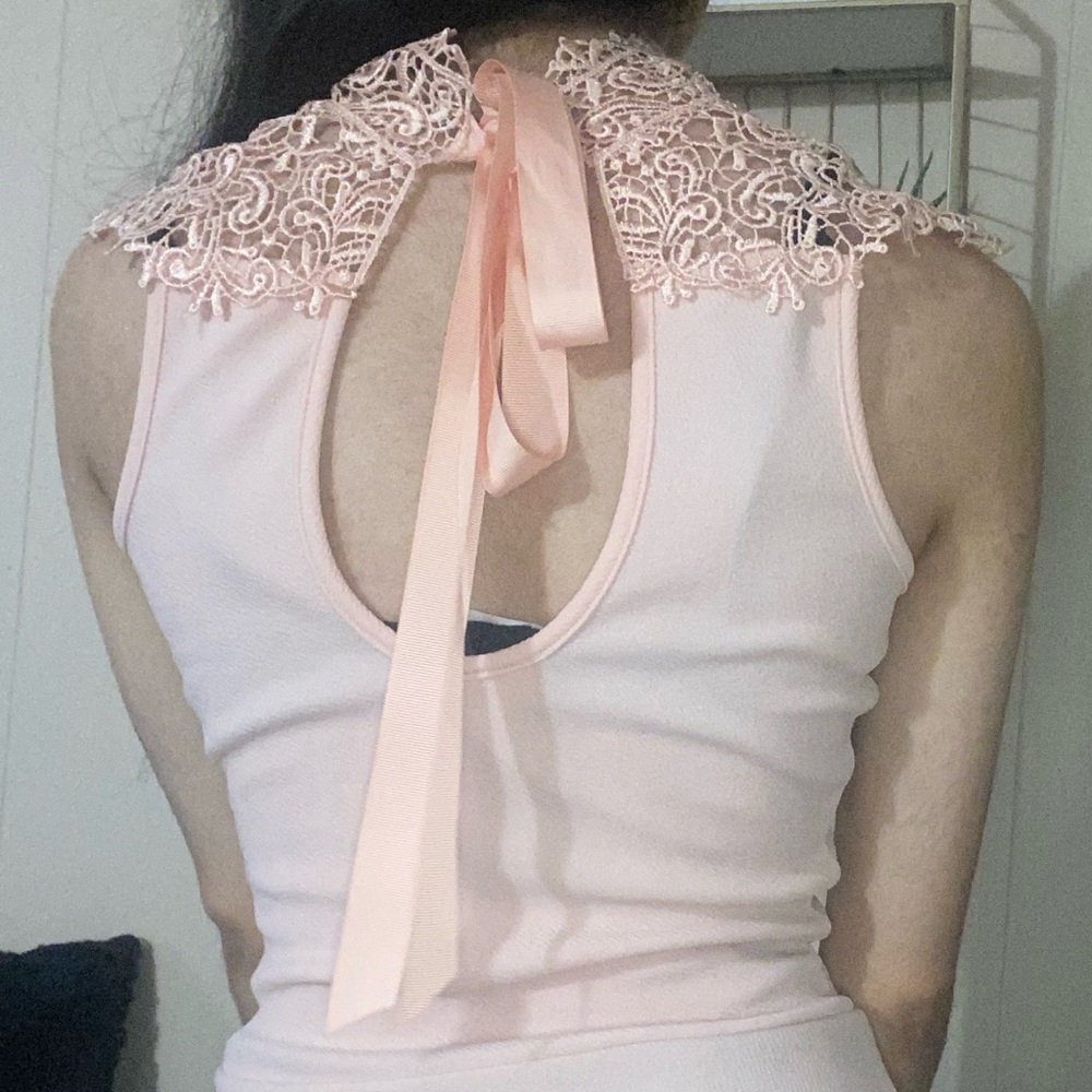 Pink Blush Blouse with a mini skirt( never used it)